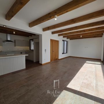 Two-story residence with harmonious distribution and natural light.