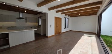 Two-story residence with harmonious distribution and natural light.