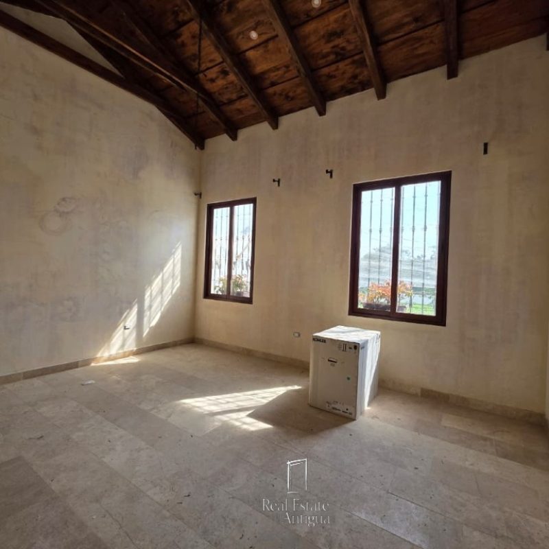 Elegant Corner Home with Pool in Prime Walkable Antigua Location